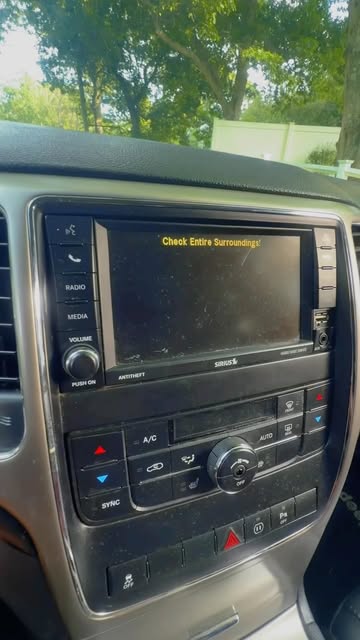 Jeep dashboard screen showing the backup camera