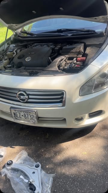 2014 Nissan Maxima with the hood open